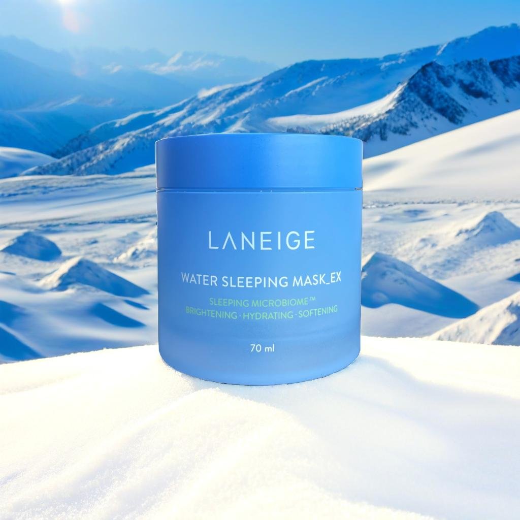 A product standing on a pile of snow, sky and mountains in the background, sun shining, shallow depth of field