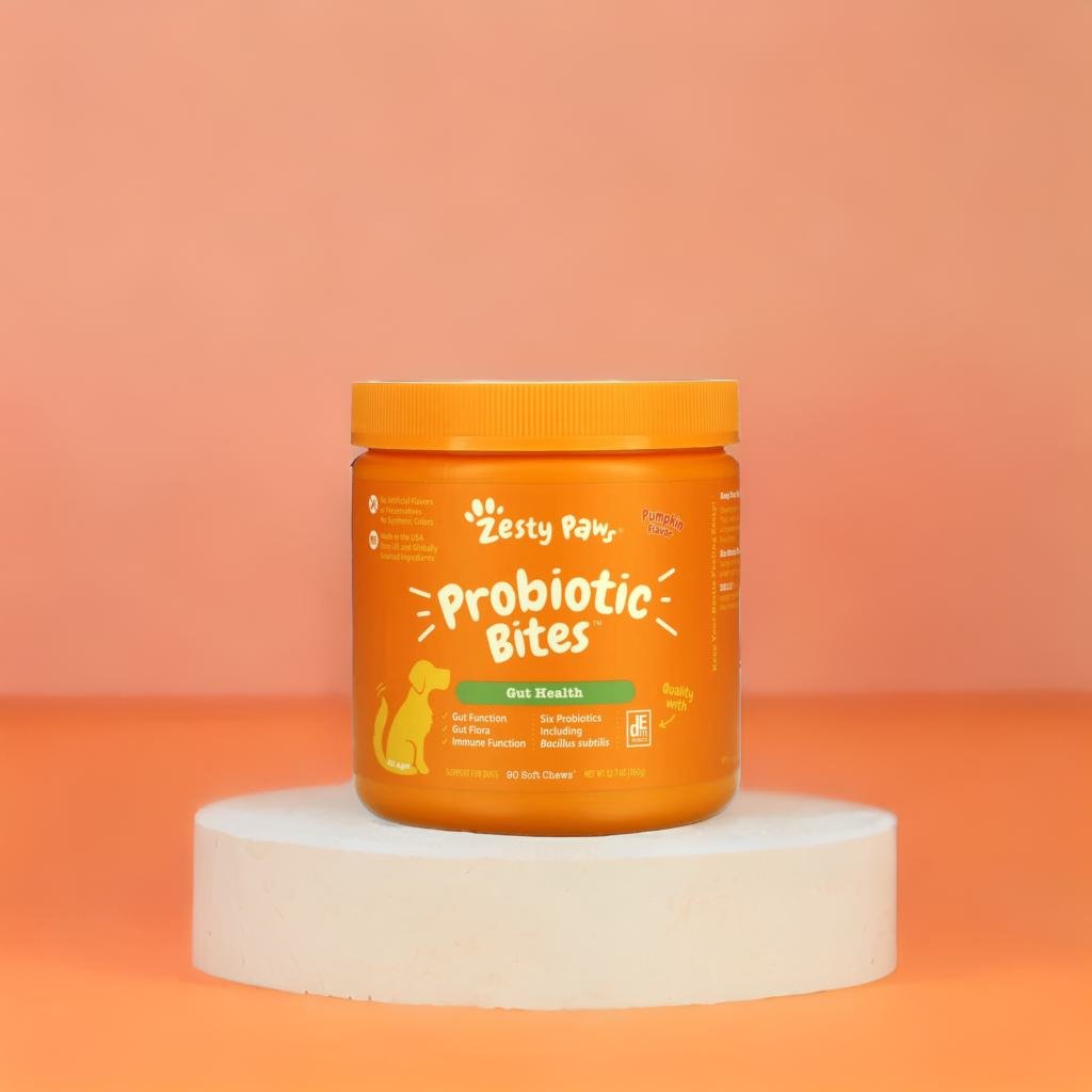 A product standing on a white riser, orange background, studio photo shoot