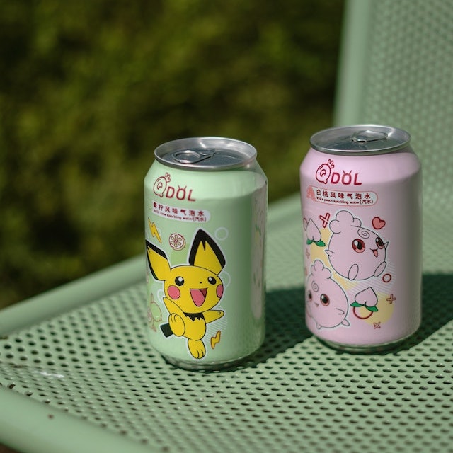 Two cute canned drinks side by side